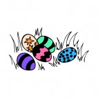 Multi colored easter eggs laying on the grass, decals stickers